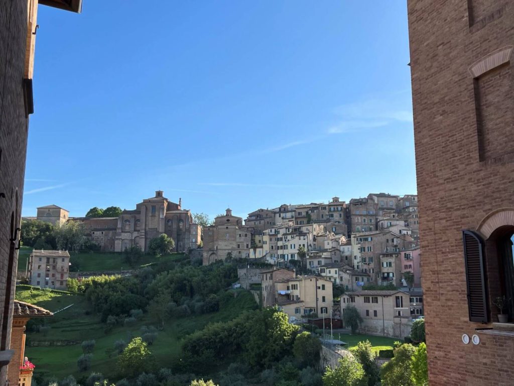 a view of siena italy from a dead-end road