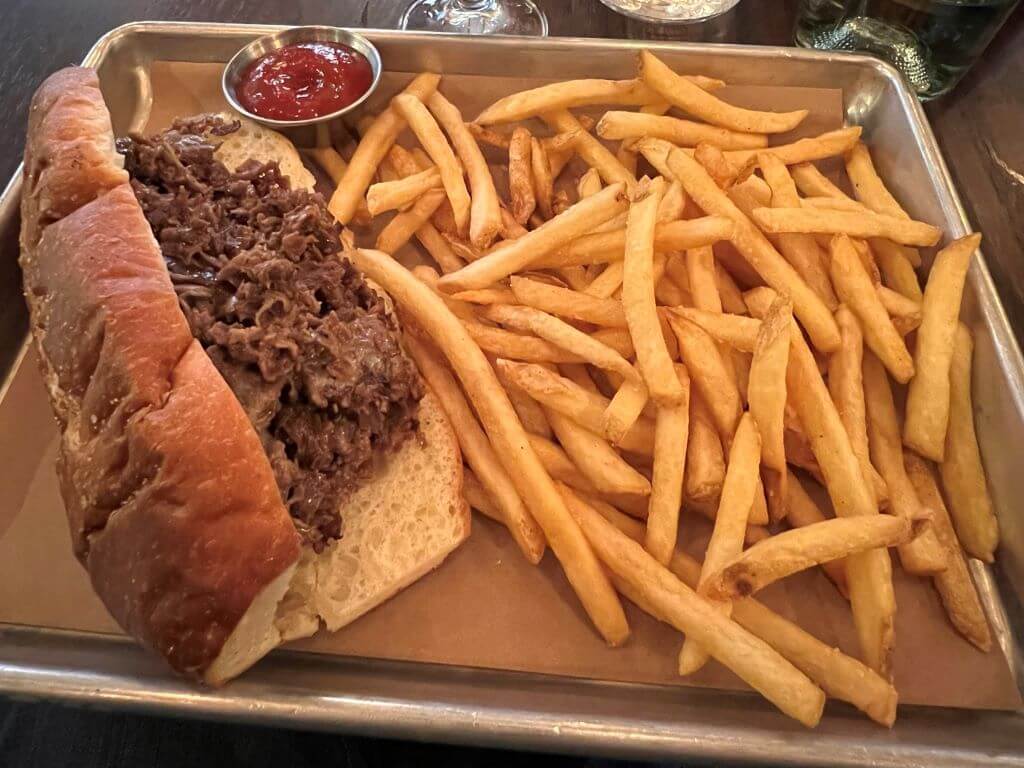 Philly Cheese Steak Sandwich With Fries In Philadelphia's Old City Red Owl Tavern