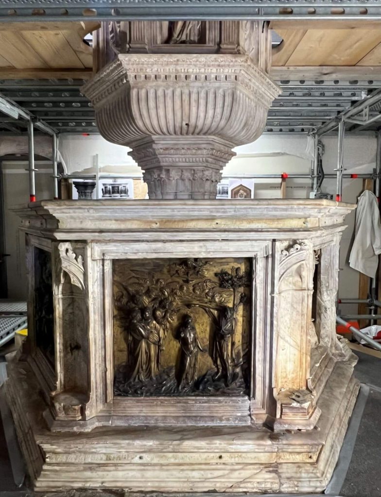 the baptistery of san giovanni's baptismal font with renovation tools scatted around