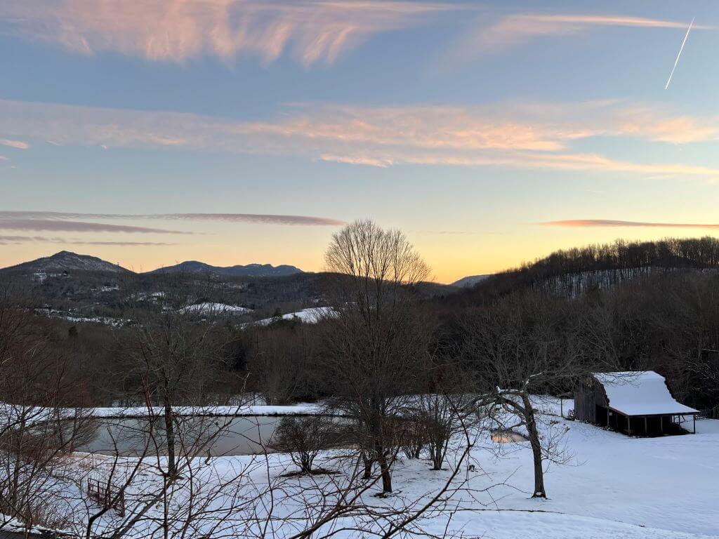 Early Morning Sunrise Over The Mountains
