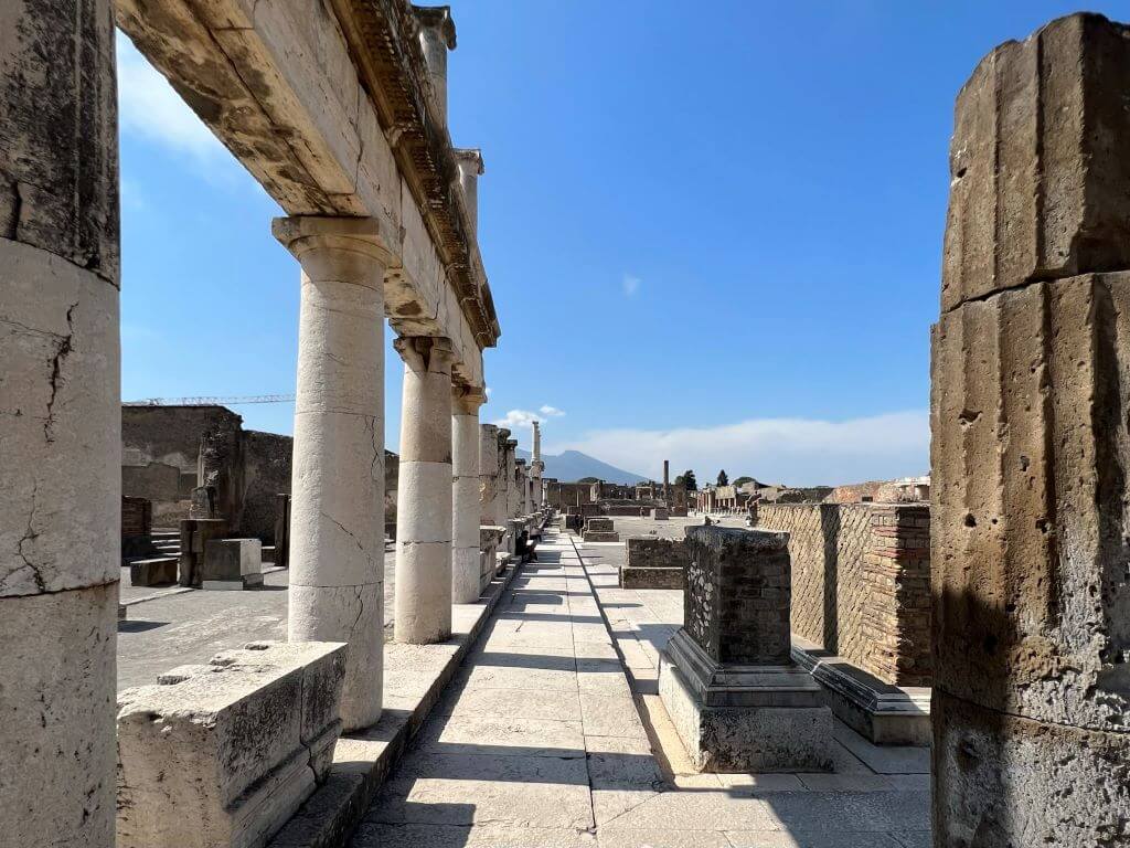 A Road With Ruins On Either Seen While Visiting Pompeii