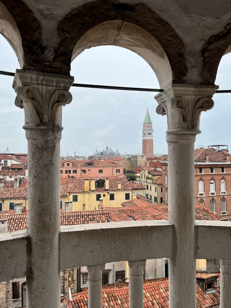 Looking At Venice While Climbing Scala Contarini Del Bovolo